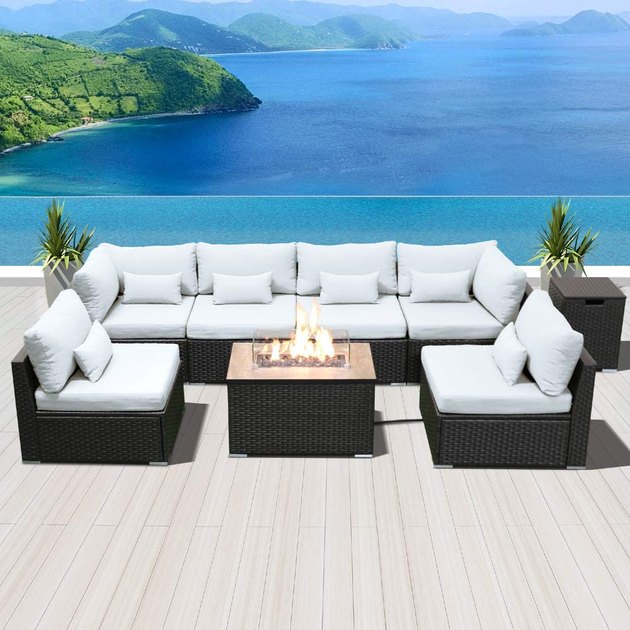 Rather than having a separate fire pit, get a patio set that includes one. Fueled by a propane tank that can be concealed in a hideaway table, it comes with lava rocks and a wind guard that’s both stylish and functional. Plus, this outdoor sectional has a modular design and can be configured in many ways.