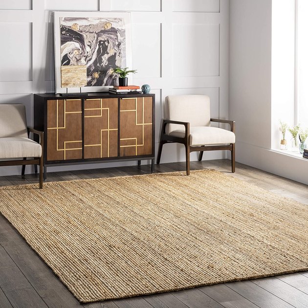 Crafted from sustainable jute, this rug is handwoven to bring a unique texture to any space.