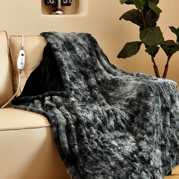 Chances are, this might be your new go-to blanket. With faux fur, six heat settings, and a four-hour timer, this blanket will feel like a total luxury buy.