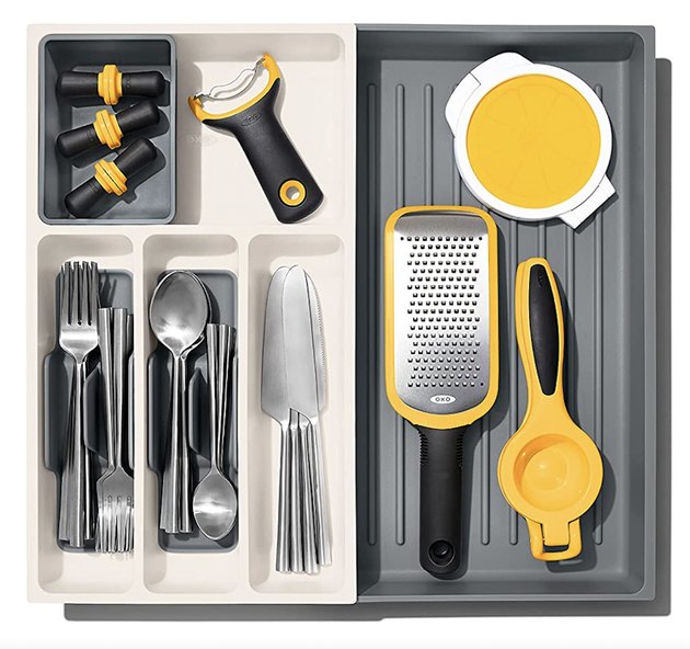 There's nothing worse than a utensil tray that's a pain to clean. Wash away any buildup in a breeze with this caddy's removable trays. Plus, the large open section is ideal for irregularly shaped tools, like can openers and graters. 