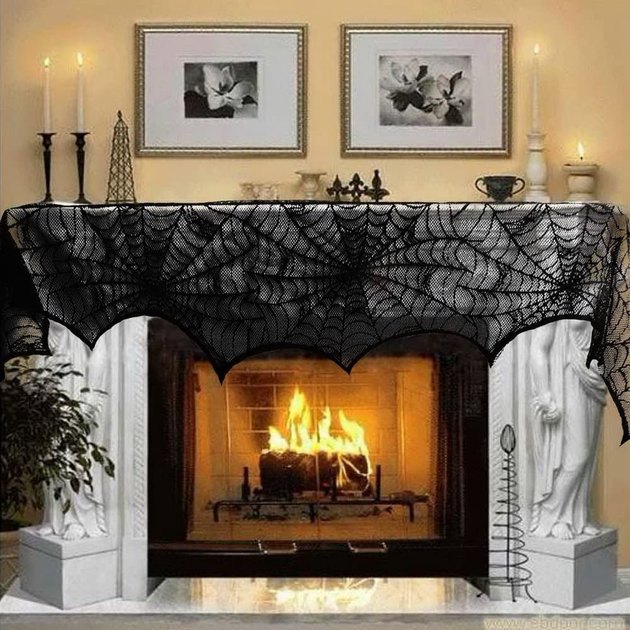 Stylish and festive, this black lace spiderweb is a simple and easy-to-use piece of Halloween decor.