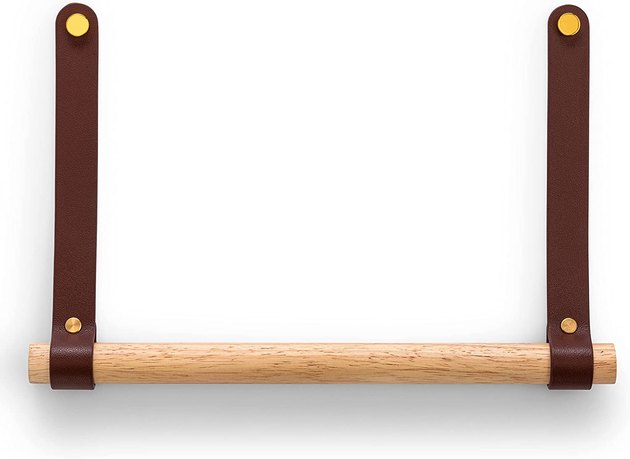Talk about space-saving style! This vegan leather and wooden towel holder is the perfect addition to your minimalist kitchen. Only two screws are needed for mounting this shockingly inexpensive stunner.