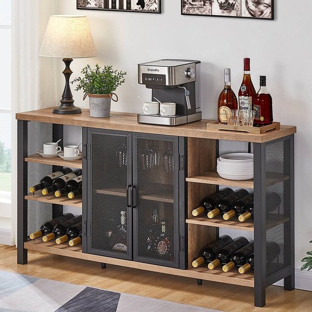 This beautiful wine cabinet is the perfect addition to your home. This wine bar includes 4 sets of removable wine racks and open shelving. 