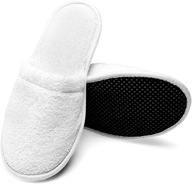 These terry cloth slippers are just what you need to get cozy on a budget. They’re a great pick for wearing around the house, or you can even take them on the go when you travel.