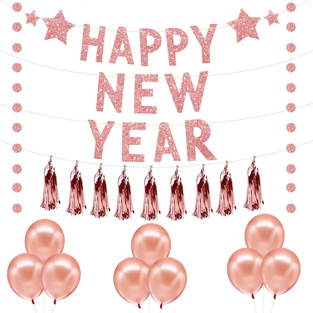 Well, this is just about the cutest decor set we've ever seen. The "Happy New Year" banner comes with a sparkly circle garland, a pack of nine rose gold tassels, and nine bonus balloons. 