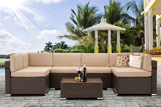 Kick back and relax with this outdoor sectional conversation set. It comes with thick cushions, can seat between four to six people comfortably, and comes with a tempered glass coffee table.