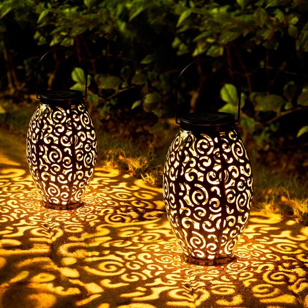 These solar lanterns cast beautiful designs when illuminated at night. They are waterproof and heatproof, so they are ready for whatever weather comes their way. 