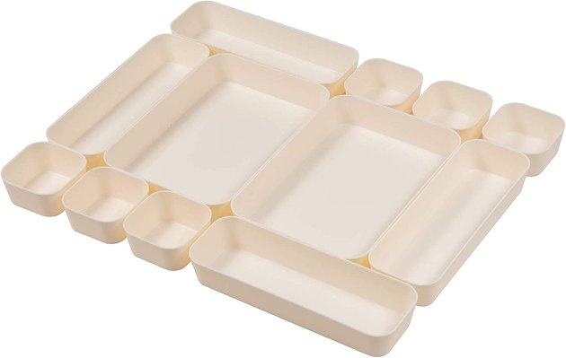 Give everything a place with this collection of 12 plastic drawer organizers. They're sturdy, easy to clean, and would even look great on a countertop.