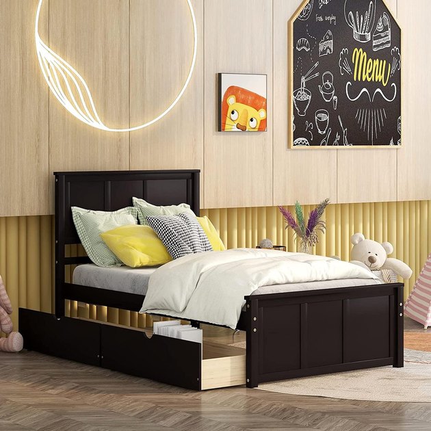 Step up your storage game with this nifty bed frame from Citylight. The simple design will look great in any little one's bedroom. Plus, it comes in a variety of neutral stains for easy matching. Plus, the price point is pretty darn great. 