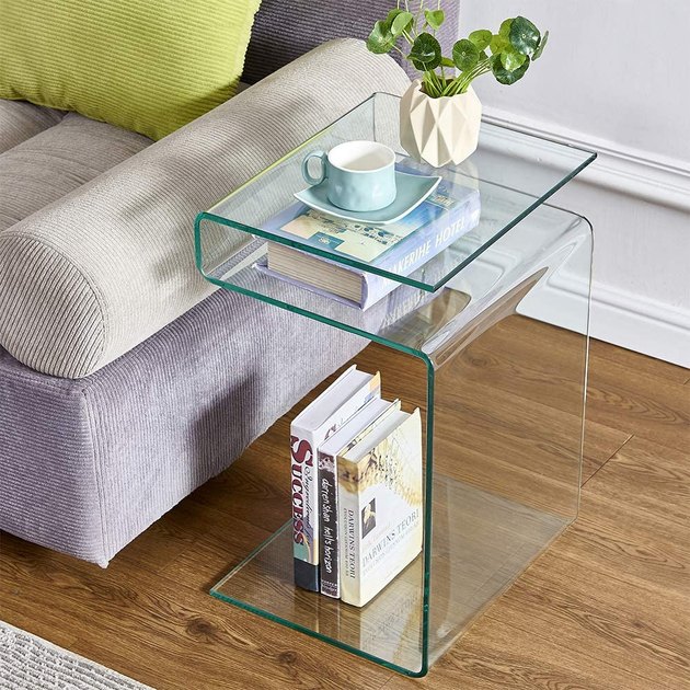 Both elegant and modern, this bedside table is expertly crafted from durable, clear glass. It uniquely displays your current reads and can totally double as a living room or even outdoor piece.