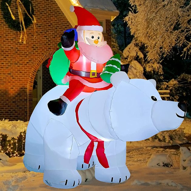 If inflatable lawn decorations are your thing, this cute Santa Claus and polar bear combo should make your Christmas decorating list.