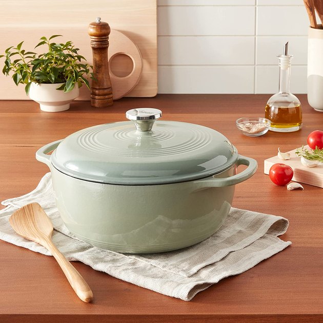 Sold in nearly 30 colors, this enameled Dutch oven has everything going for it. Offered in six sizes ranging from 1.5 to 7.5 quarts, there's a model sure to fit any family. This vessel also features a sleek stainless steel knob and a smooth, off-white enamel cooking surface.