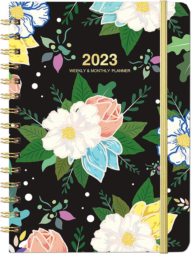 This compact planner measures approximately 6.4" × 8.5," and includes monthly tabs, thick paper, and strong wire binding. Its pattern is unquestionably adorable, too.