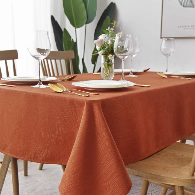 This mesmerizing tablecloth features a jacquard swirl design – plus a stunning rust hue. It’s available in tons of sizes, including three square options.