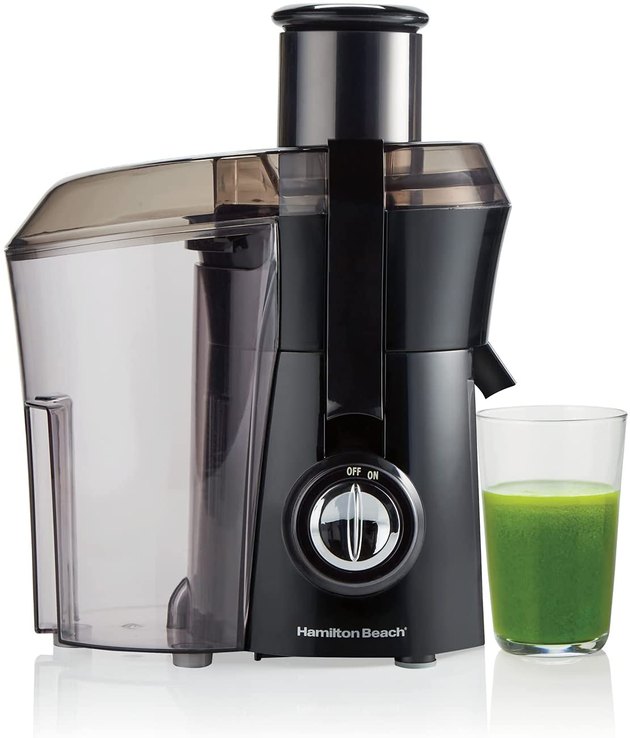 Hamilton Beach is back at it again with some of the most affordable and high quality products on the market. Ringing up at just under $65, this juicer features a big mouth to conveniently fit whole fruits and vegetables, an extra-large pulp bin for longer juicing, and a powerful 800 watt motor. Plus, this model comes with a cleaning brush and a little book of recipes to get you started.