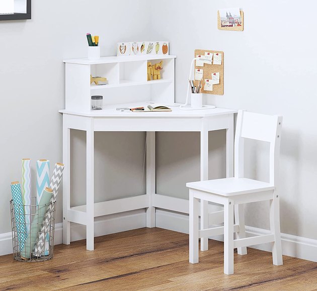 This children's desk set is crafted from high-quality engineered wood for optimal sturdiness and stability. The neutral white finish will look great in any room, plus the corner setup and bonus storage makes the most of your small space.