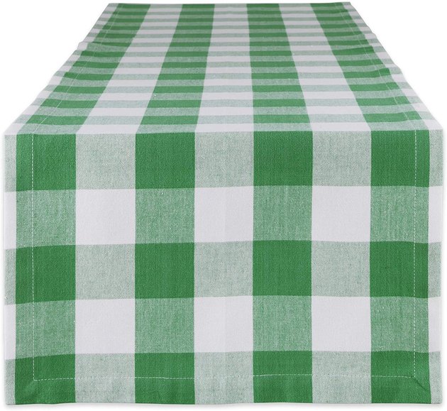 This sweet table runner can really be used year-round. It is machine washable, 100% cotton, very affordable, and far from being too loud or overdone. Add some garland along the center for a winning tablescape. 