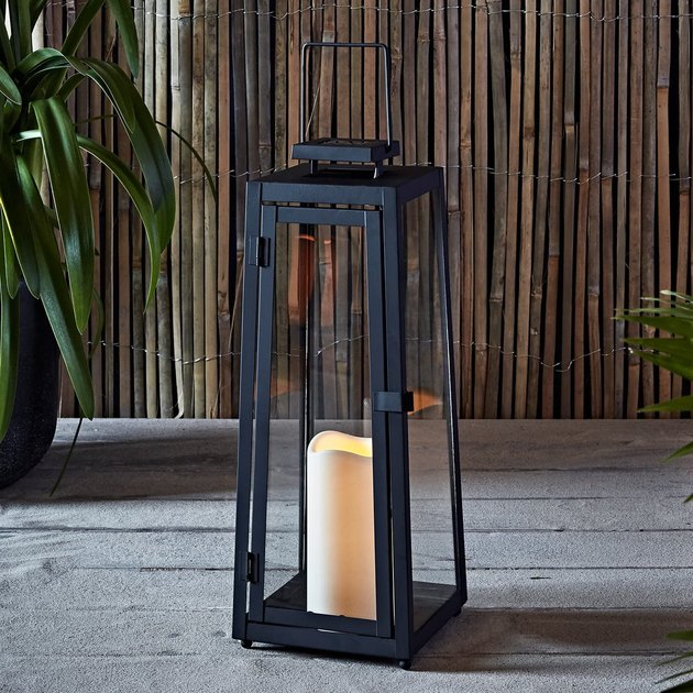 This lantern features clean, geometric lines which makes it an elegant addition to your backyard or garden. It provides eight hours of illumination during the evening in the spring and summer. 