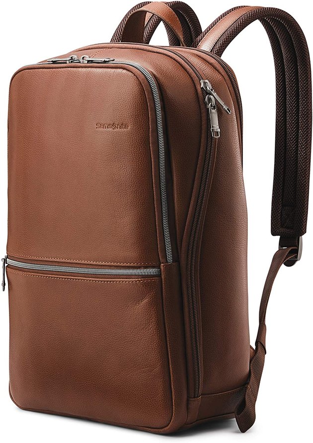 This is a classic leather design backpack with a modern spin. It features a dedicated padded laptop pocket and a full-sized organizer pocket in the front. 

