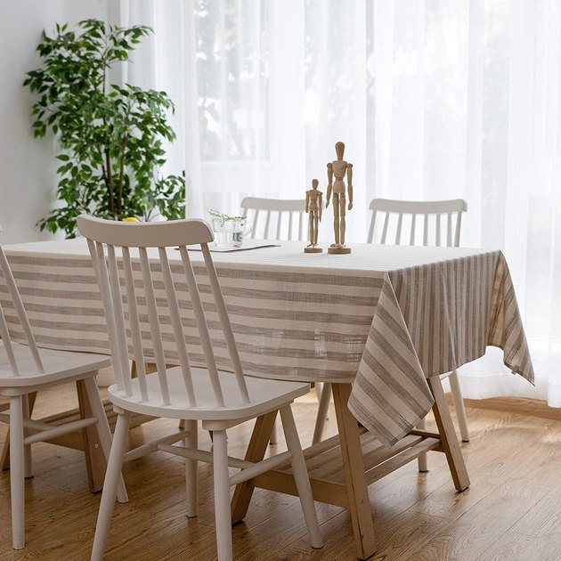 Meet the perfect backdrop for your next farm-to-table meal. This washable cotton and linen tablecloth features cream and taupe stripes, plus a subtle aged look.
