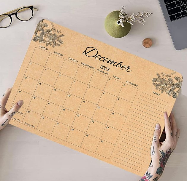 Each calendar page is double-sided, with a blank coloring page on the back of every month. Display it across your desk or hang it on the wall — whichever floats your boat!