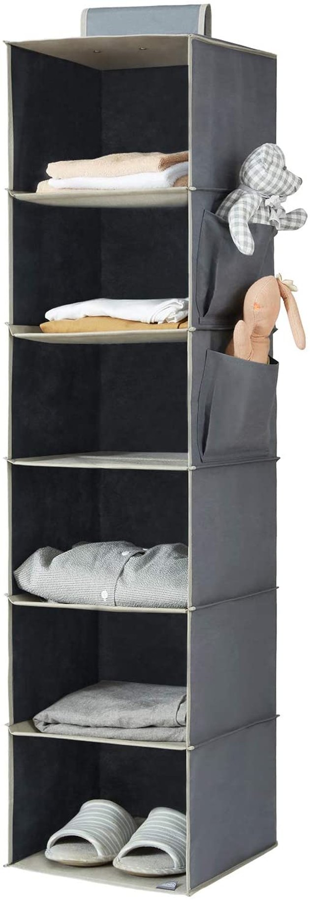 Declutter your closet and keep your clothes in good shape with this hanging closet organizer. It comes with six shelves spacious enough for bulky sweaters or jeans.