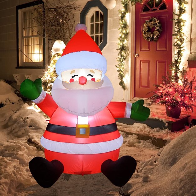 Illuminated with LED lights, this joyful-looking Santa Claus can spread the Christmas spirit from your lawn all night long.