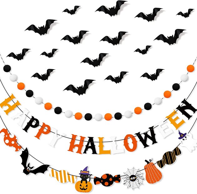 Get in the Halloween spirit with this Halloween decor set, which includes garlands, banners, and sticker bats for your walls.