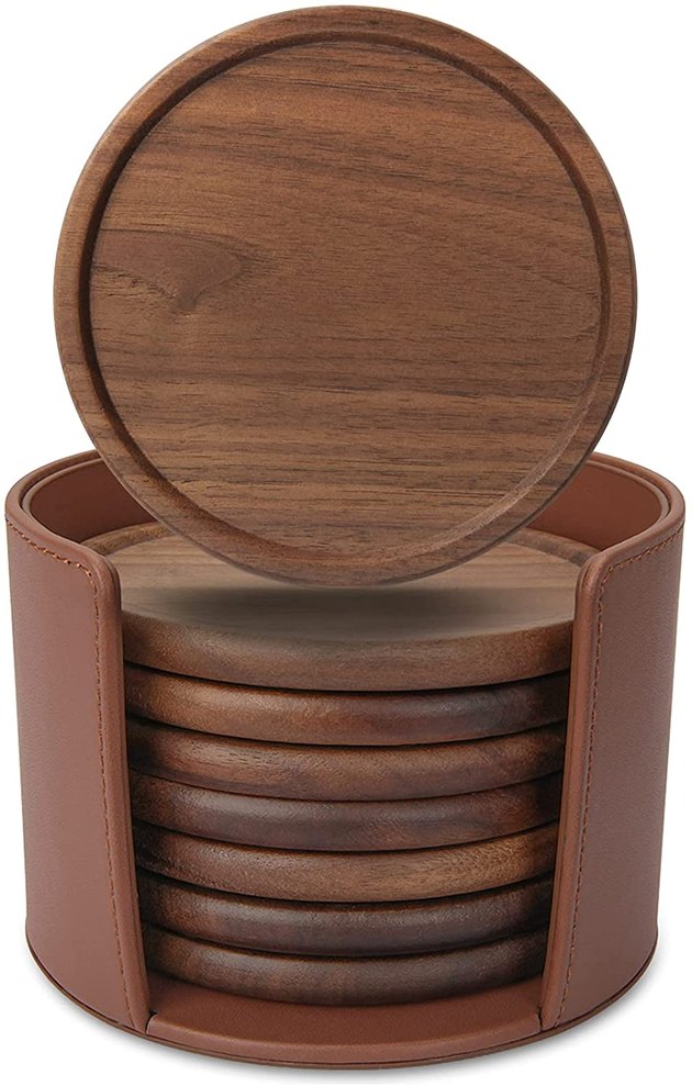 A set of wooden coasters housed in a leather container is a true no brainer. The raised edges are cleverly crafted to catch condensation and the eight-pack is perfect for large families or house guests.