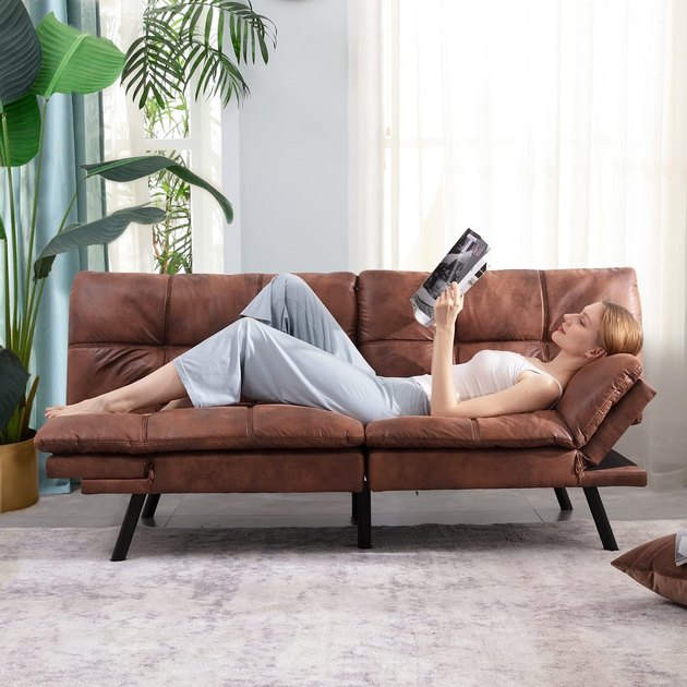 Between the sleek button tufting, rich camel color, midcentury modern design, and very happy price point, this sleeper sofa is a no-brainer for your living room, office, or guest room.