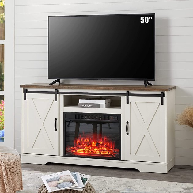 This TV stand with an electrical fireplace holds TVs up to 65". This TV stand comes in a farmhouse white finish with 3 adjustable levels for side shelves.