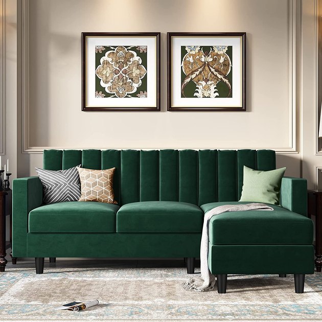 If you're lacking square footage but still want a sectional sofa, choose this channel-tufted model, which has an ottoman that converts to a chaise.