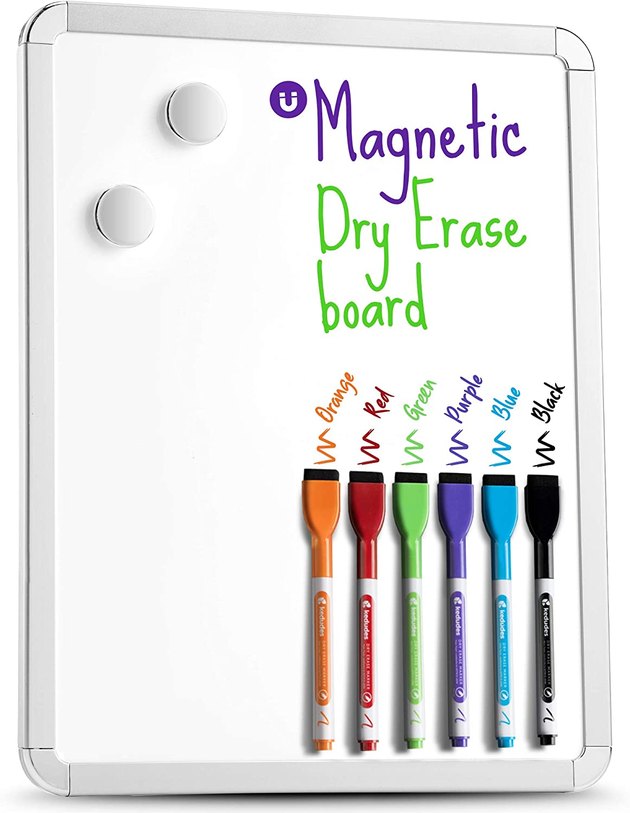 Keep track of all your tasks with this small, lightweight dry erase board. It comes with six colorful markers that each have a magnetic eraser cap for easy storage.