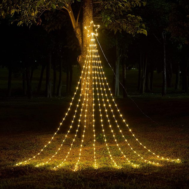 Channel the Christmas spirit without a formal Christmas tree, thanks to this faux tree made of string lights.