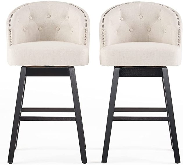 Upgrade your bar seating with this beautiful beige stool. Your lower back will be happy. 