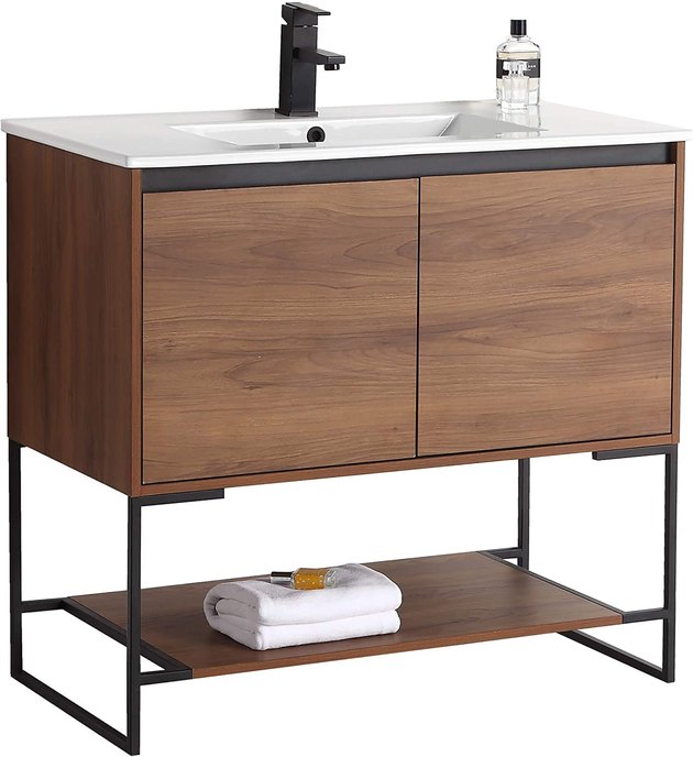 Keep it clean with this contemporary bathroom vanity. The cabinet and shelf add ample bathroom storage and all hardware is included for a simple installation. Please note that the faucet and drain are sold separately.