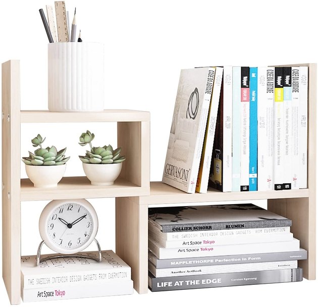 Craft the perfect, stylish desktop with this adjustable office storage rack. Made of sleek, natural wood, all you need is a flat surface to get that chic, minimalist look.