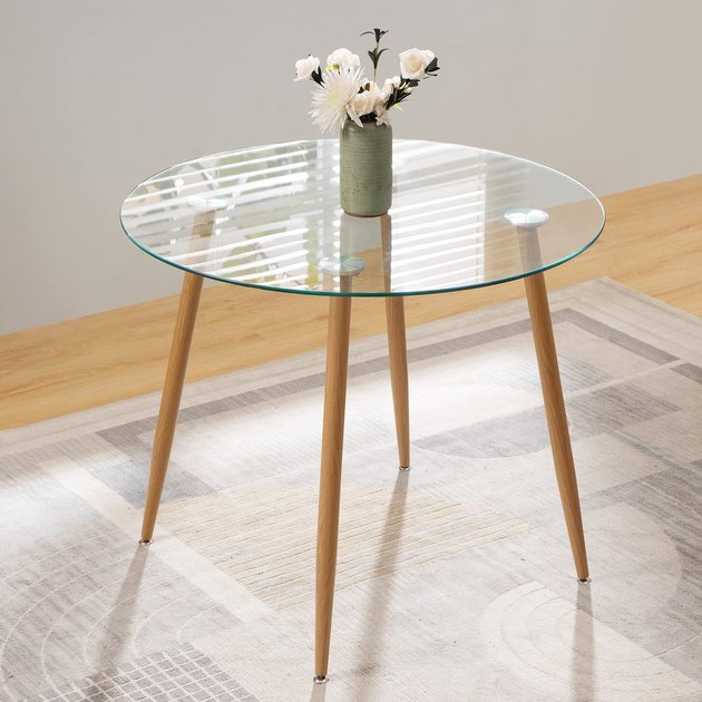 At just 35 inches in diameter, this affordable glass-top dining table is ideal for small spaces, such as apartments with no true dining room or a little breakfast nook.