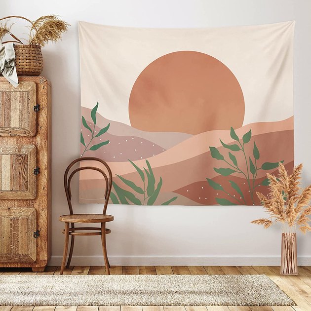 Tapestries are a classic dorm choice and this one's our favorite on the market. Available in three nature-inspired patterns, this beauty even comes with two non-mark hooks and two clips for easy hanging.