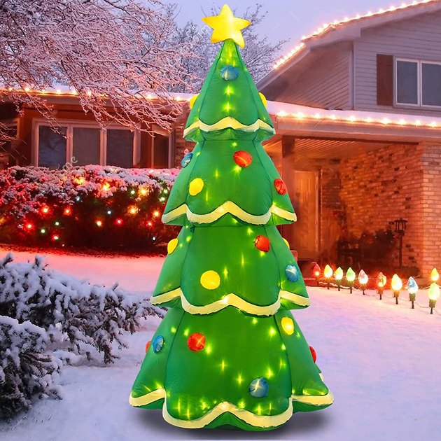 If your yard doesn't have its own evergreen trees, set up this waterproof, inflatable Christmas tree instead — no decorating necessary! It's lit up from within thanks to LED lights.