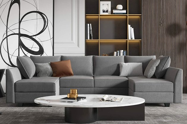 This modular sofa is perfect for big groups and lots of storage needs. It also comes in three different colors in case grey isn't your hue.