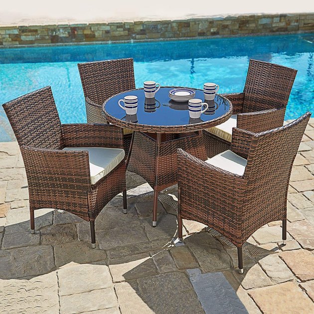 This hearty woven dining set looks so much more expensive than it actually is. All-weather wicker and tempered glass join forces to create a set that's both elegant and casual, and of course practical.