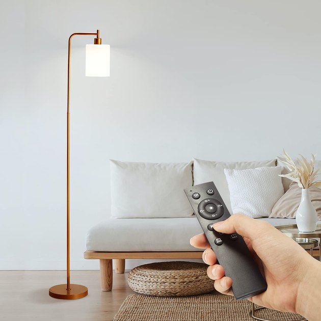 Use a handy-dandy remote to change the temperature and brightness of this sleek floor lamp, which has a slim, elegant profile to fit small spaces.