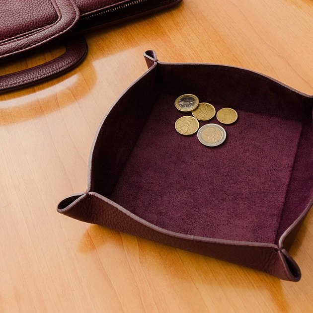 This ultra-soft leather tray is simply exquisite. Offered in five rich colors — including a deep wine and navy blue — there is truly no detail that's been overlooked. 