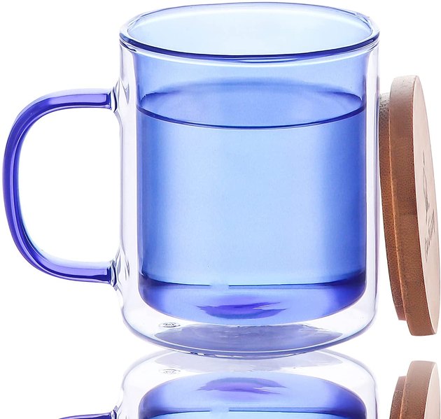 Drink hot and cold beverages in this colorful coffee mug. It has a lid (that you can also use as a coaster) and double walls to keep you drink at a steady temperature for an extended period of time.