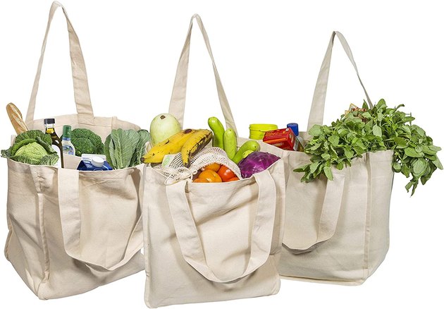 These cream cotton totes are simple, stylish, and sturdy. Each one has six interior bottle sleeves and comfortable shoulder straps. They're also unbleached, organic, and biodegradable.
