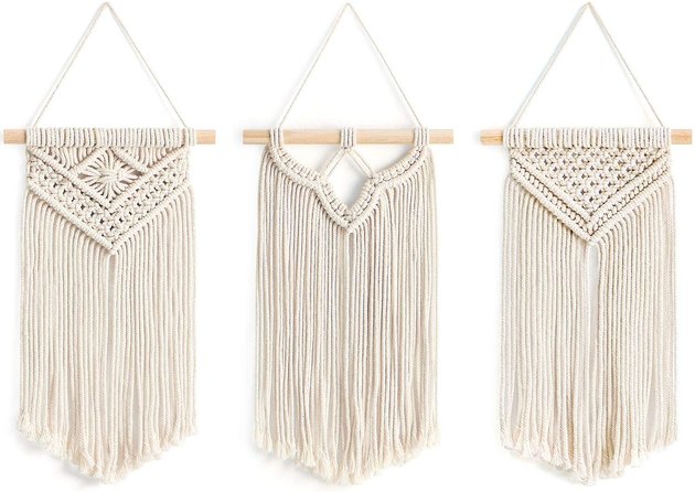 Add some artsy flair with this incredibly affordable macramé wall art. Hang the three in a row or scatter them around the room to tie the whole space together. They feature intricate woven patterns while remaining incredibly neutral.