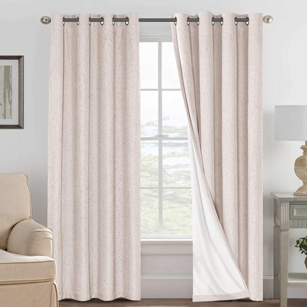 Although linen itself doesn't do a great job of blocking light, these linen blackout curtains are lined with a thick material that is very effective at blocking light, providing insulation, and even reducing noise.