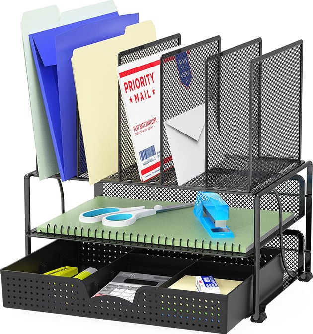 Talk about a major space saver. This mesh organizer has five sections on top for files and mail, a letter tray, and a drawer with multiple compartments to store everything from sticky notes to pens.