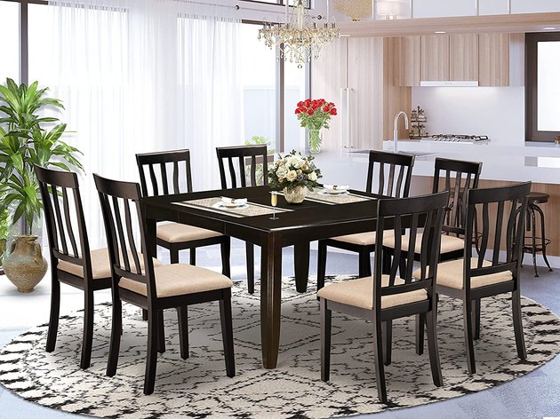 Featuring an oversized, square-shaped table that's perfect for hosting dinner parties, this dining set comfortably seats eight and makes it easy for everyone at the table to chat no matter where they're sitting. 